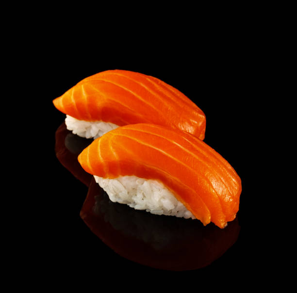 istock Set sushi roll. Traditional Japanese cuisine. Isolated on black background 1178518228
