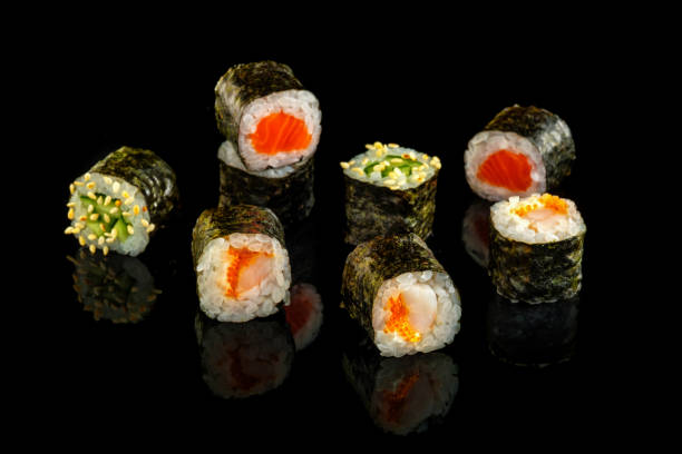 istock Set sushi roll. Traditional Japanese cuisine. Isolated on black background 1178518897