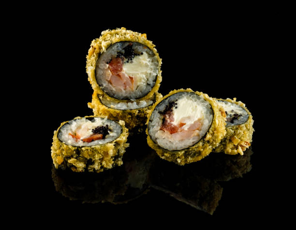 istock Set sushi roll. Traditional Japanese cuisine. Isolated on black background 1178518913