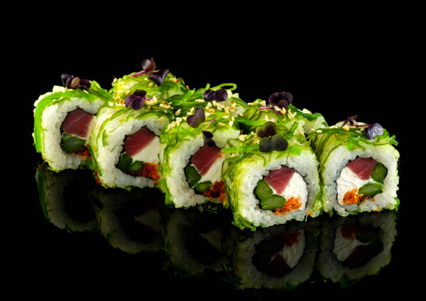 istock Set sushi roll. Traditional Japanese cuisine. Isolated on black background 1178519024