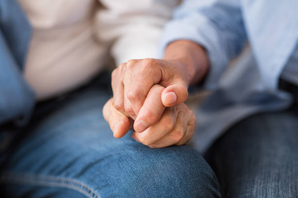 istock Love and support concept. Senior couple tenderly holding hands 1178519133