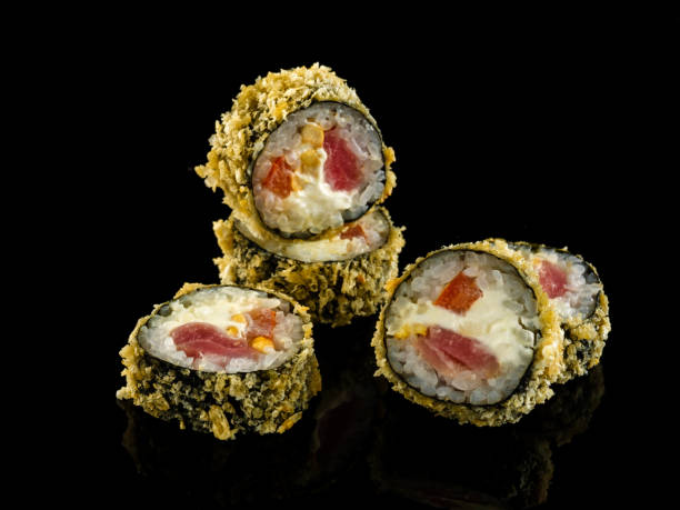 istock Set sushi roll. Traditional Japanese cuisine. Isolated on black background 1178519313