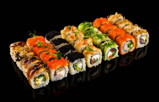 istock Set sushi roll. Traditional Japanese cuisine. Isolated on black background 1178519351