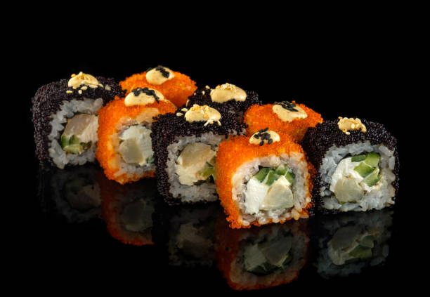 istock Set sushi roll. Traditional Japanese cuisine. Isolated on black background 1178519641
