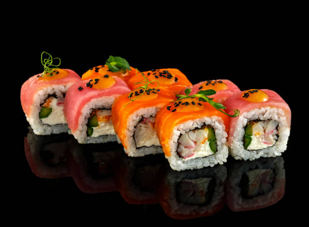 istock Set sushi roll. Traditional Japanese cuisine. Isolated on black background 1178519849