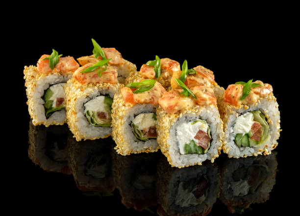 istock Set sushi roll. Traditional Japanese cuisine. Isolated on black background 1178520535