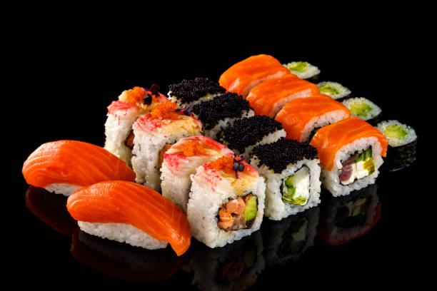 istock Set sushi roll. Traditional Japanese cuisine. Isolated on black background 1178520601