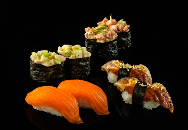 istock Set sushi roll. Traditional Japanese cuisine. Isolated on black background 1178520678