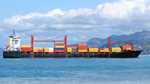 istock Sea shipping - container ship comes to harbour. 1178522099