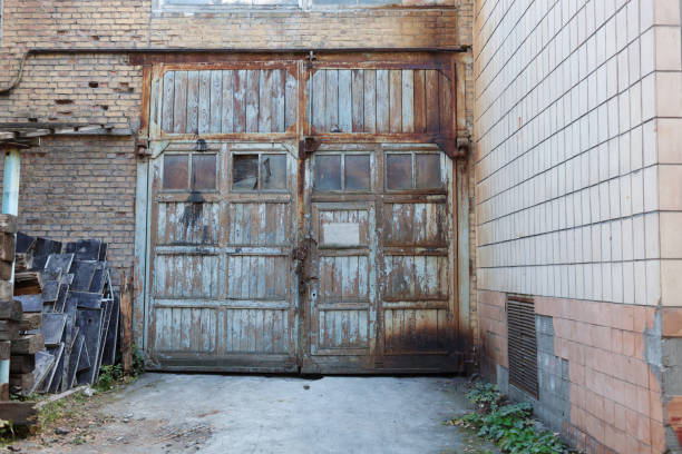 istock Old vintage wall with worn wooden door 1178522147