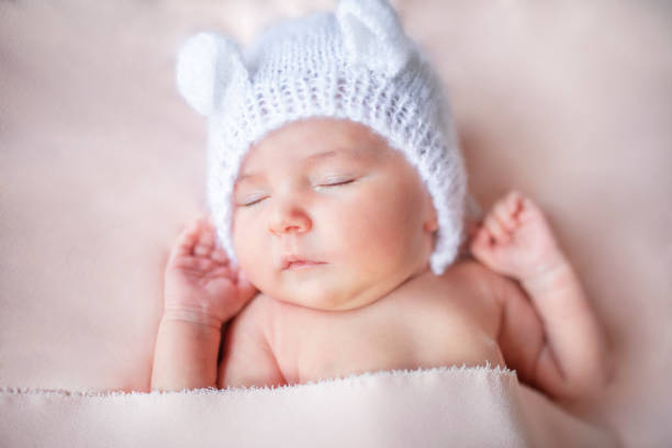 istock Sleeping newborn baby on a blanket 1178522401