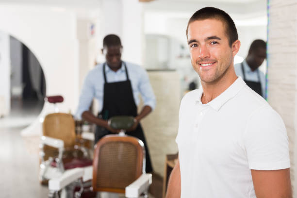 istock Man satisfied with service in barbershop 1178523791
