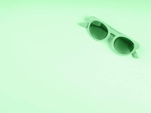 istock Mint green sun glasses. Color 2020 flat lay 1178524078