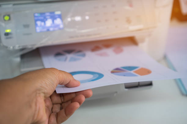 istock Business printer / printing documents in office concept:Businessman press document graph for report finacial in laser printed cartridge feeder, scanner machine for copy chart in busy offices 1178524754