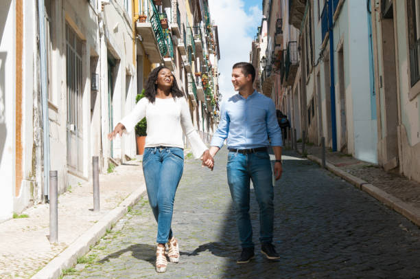istock Happy mix raced couple walking outside 1178526431