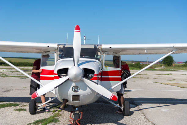 istock A beautiful, young business lady and her personal pilot. 1178526785