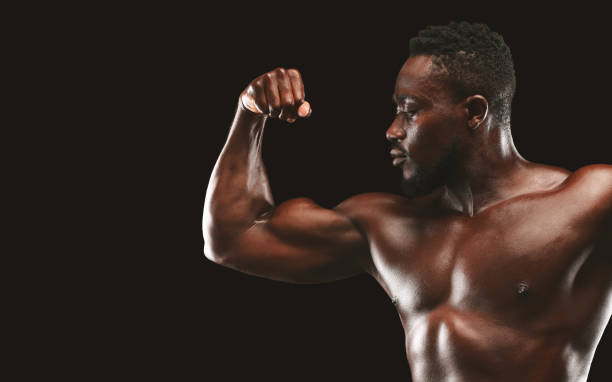 istock Cropped image of black guy showing his great biceps 1178526941
