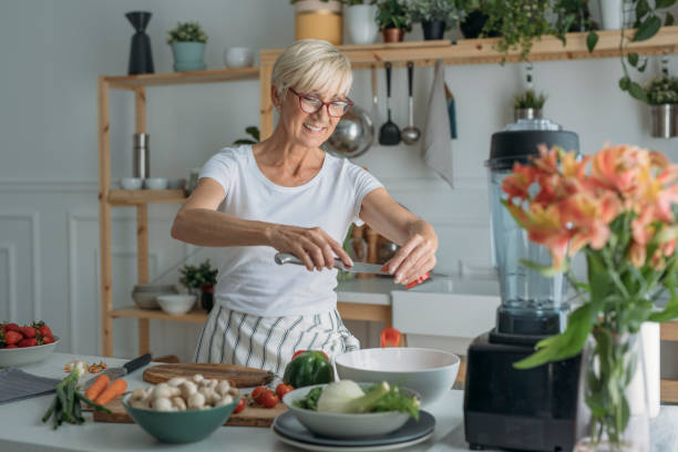 istock Woman Making Salad st Kitchen 1178526994