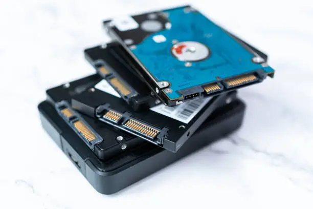 Internal and external solid state hard drives on the table.
