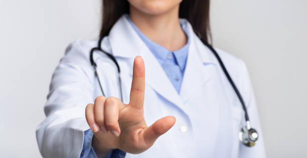 istock Doctor Using Invisible Medical Touchscreen Pressing Button, Cropped, Panorama 1178528806