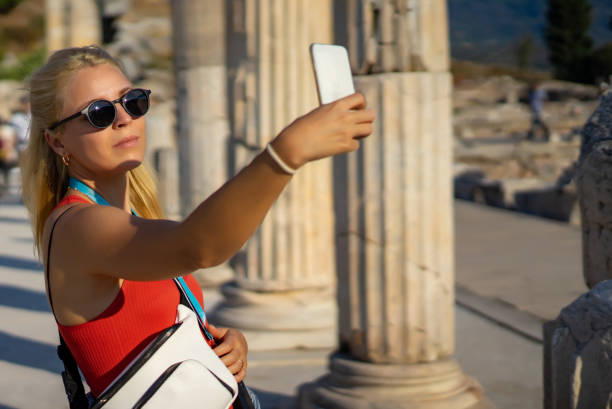 istock woman taking selfie photo 1178529589