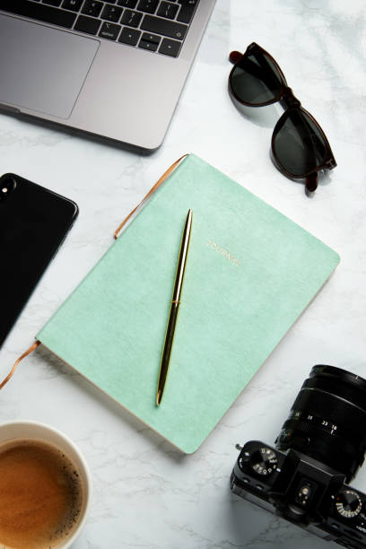 istock Flat Lay Shot Of Techno Items For Modern Worker With Laptop Mobile Phone Journal And Camera 1178529957