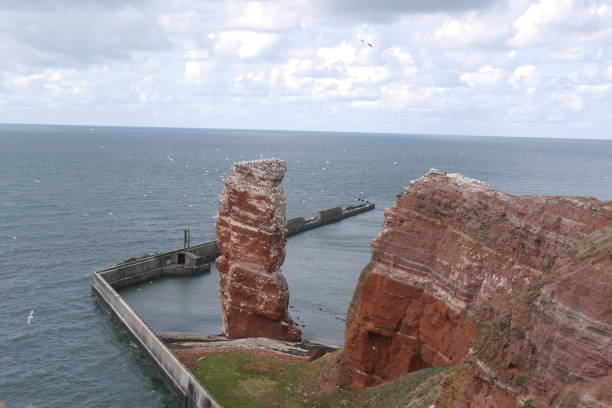 istock Sea stack in Heligoland, Germany with Coastal Protection 1178529992