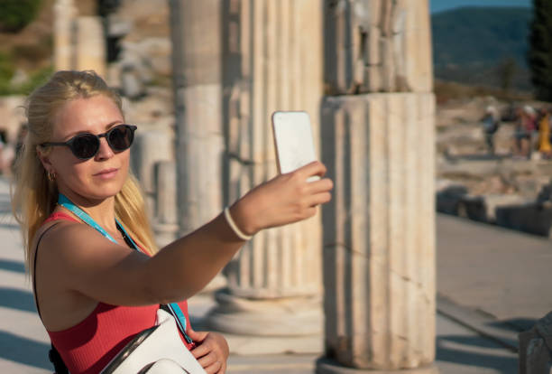 istock woman taking selfie photo 1178530152