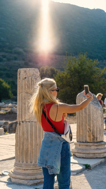 istock woman taking selfie photo 1178531436