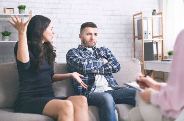 istock Young millennial couple arguing at psychotherapist session 1178532712