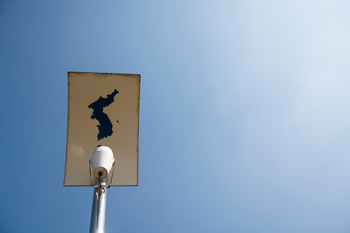 A map of an undivided Korean peninsula is seen at the top of a light pole at Dorasan Peace Park in the South Korean side of the DMZ.