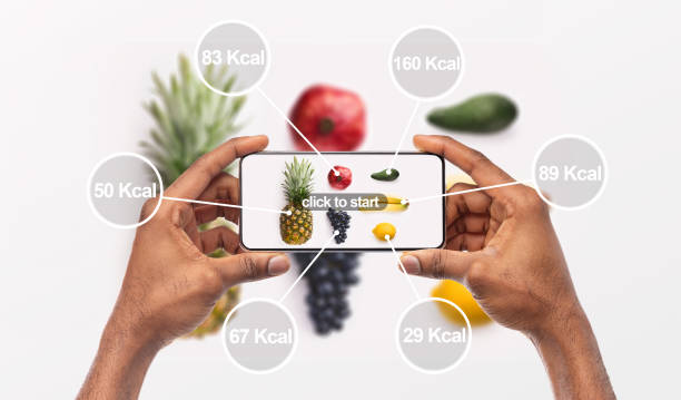istock Woman holding cellphone with application which counting calories 1178534785