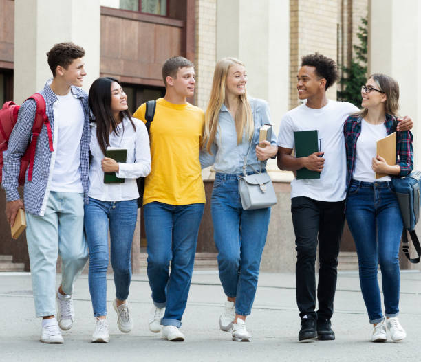 istock College students walking in campus and talking outdoors 1178535152