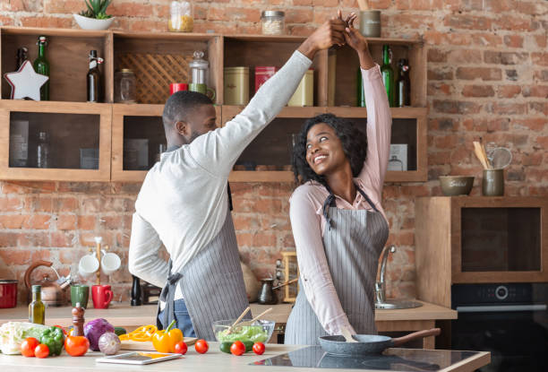 istock African american couple in love dancing in kitchen 1178536234