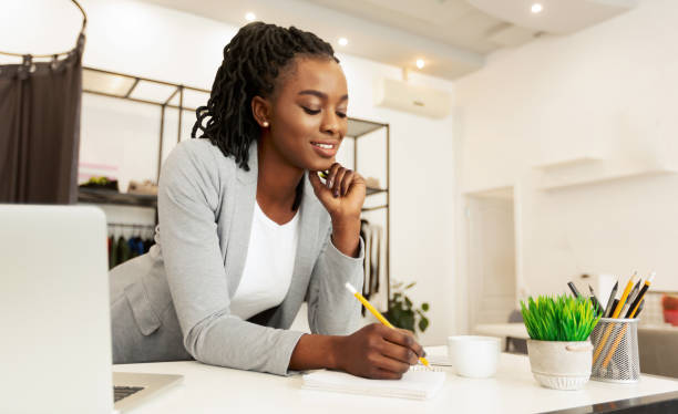 istock Young Fashion Designer Drawing Sketches At Workplace 1178536576