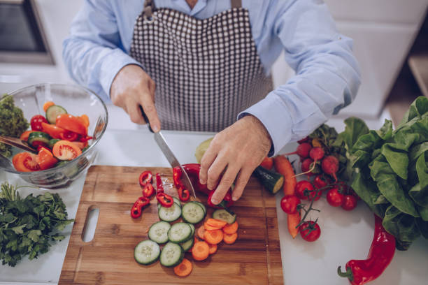 istock the chef's hands are chopping vegetables with a knife 1178537676