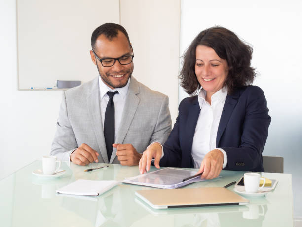 istock Cheerful business people signing contract 1178537876