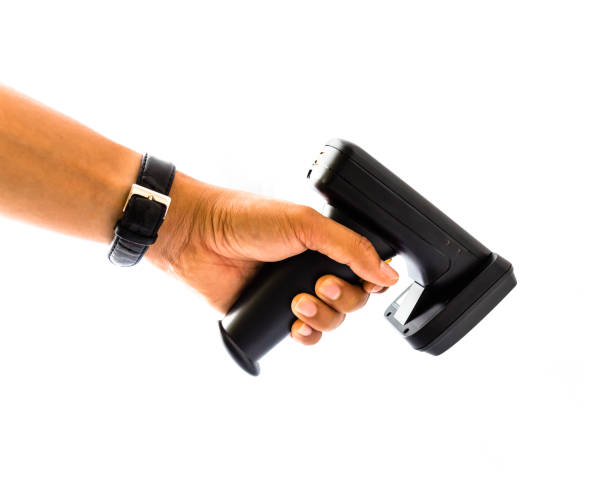 istock Close-up left male hand wears watch using RFID scanner isolated on white 1178541747
