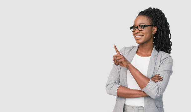 istock Afro Office Girl Pointing Finger At Empty Space, Studio Shot 1178543298