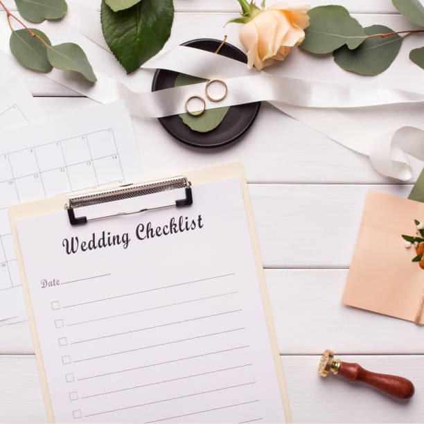istock Wedding checklist and accessories on white wooden background 1178545191
