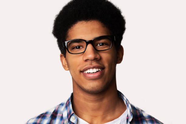 istock Happy student guy wearing glasses, light background 1178546732