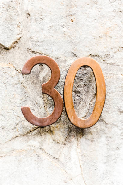 istock House Number 30 on the Building Wall 1178548118