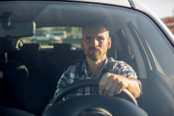 istock Angry driver drives a car in the city. 1178550239