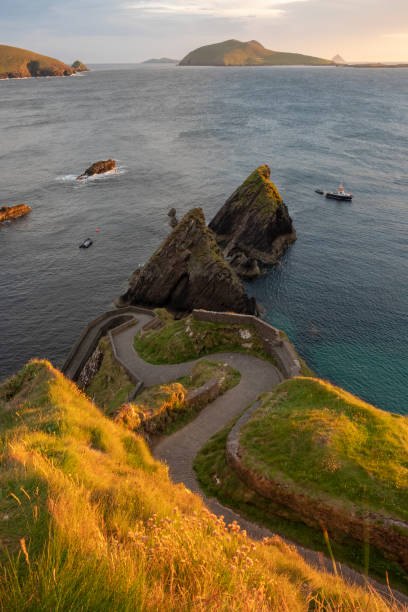 istock Dunquin pier at Dingle peninsula at sunset 1178551180