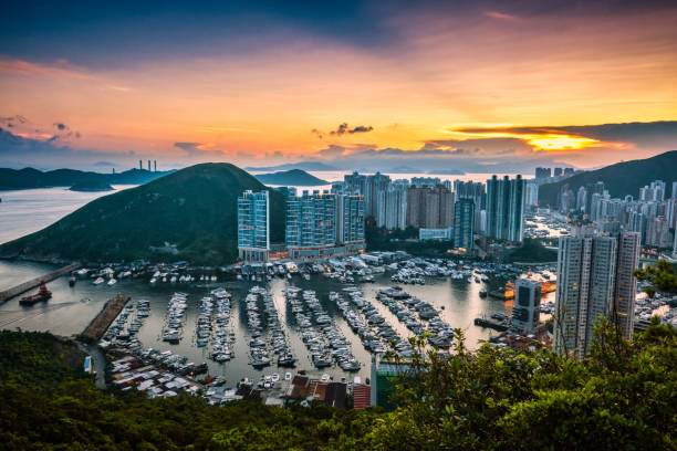 Beautiful sunset at Aberdeen Typhoon Shelters,hong kong Beautiful sunset at Aberdeen Typhoon Shelters,hong kong aberdeen hong kong photos stock pictures, royalty-free photos & images