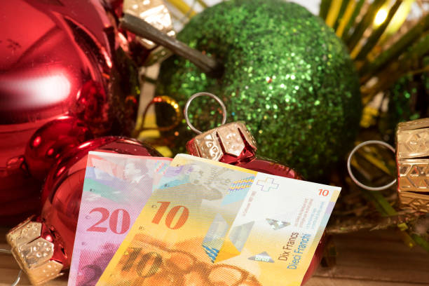 istock Christmas and banknotes Swiss francs 1178552966