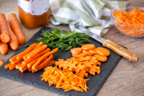 istock Fresh carrot juice on wooden table 1178553561