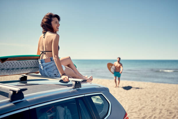 istock sexy woman on the beach ready for surfing 1178555451