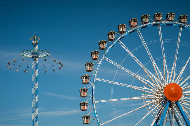 Munich, Germany - September 29, 2019: Oktoberfest in Munich with the traditional Standkonzert in front of the Bavaria StatueMunich, Germany - September 29, 2019: Oktoberfest in Munich detail viewMunich, Germany - September 29, 2019: Oktoberfest in Munich detail view