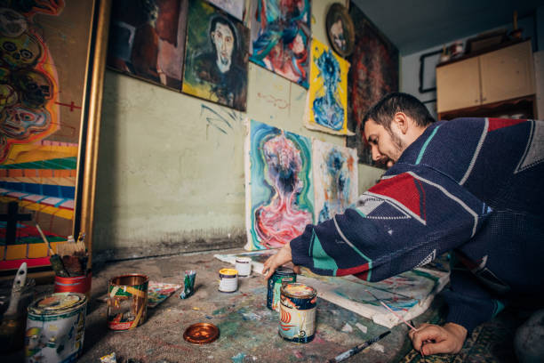 istock Man painting on the floor 1178557012